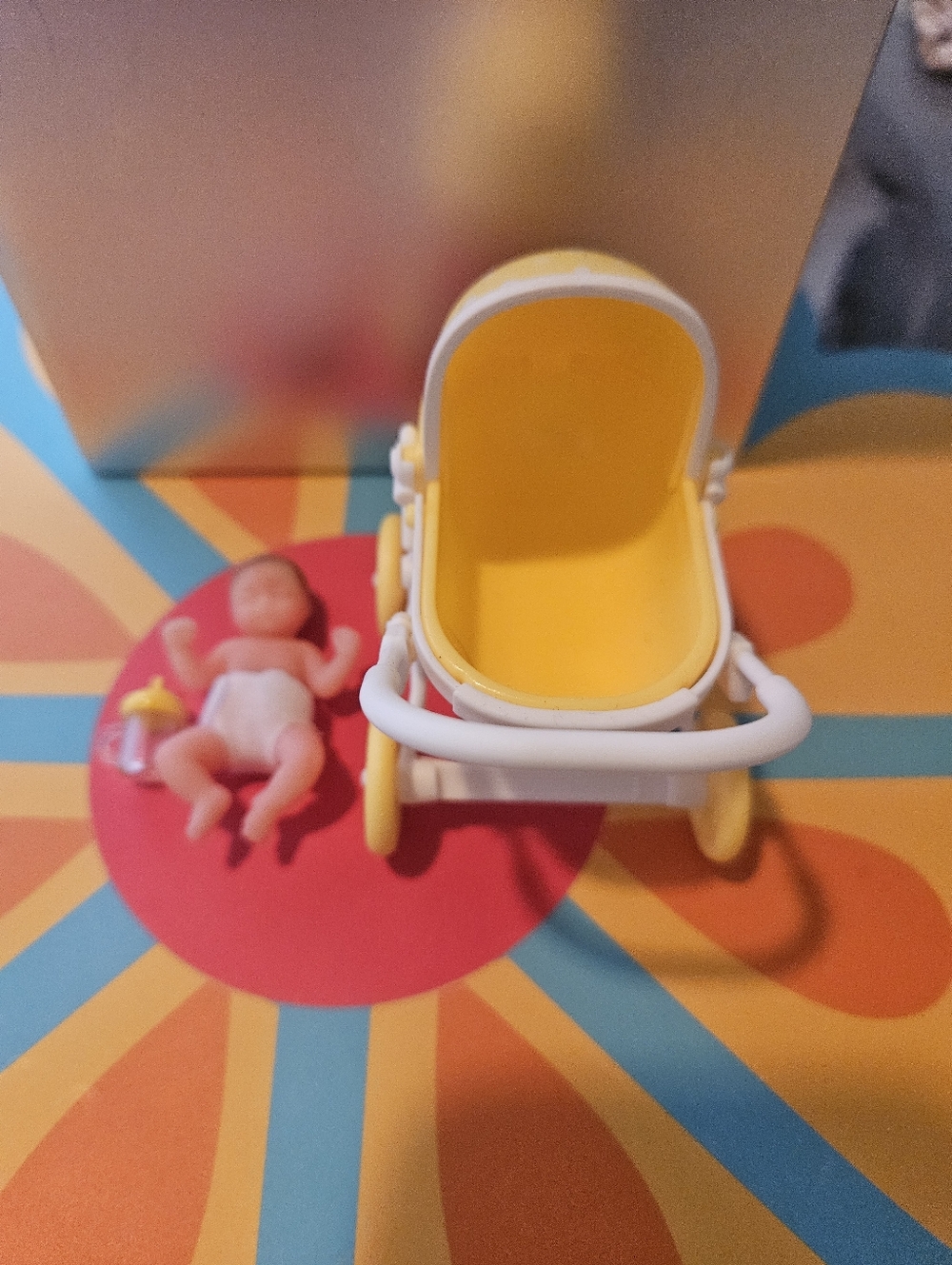 Zuru Mini Baby Doll in Yellow Polka-Dot Stroller - Picture 3 of 7